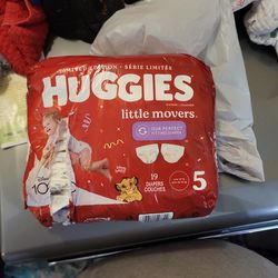Package of nineteen diapers by huggy size five