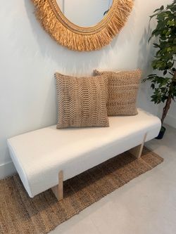 Cream and wooden bench