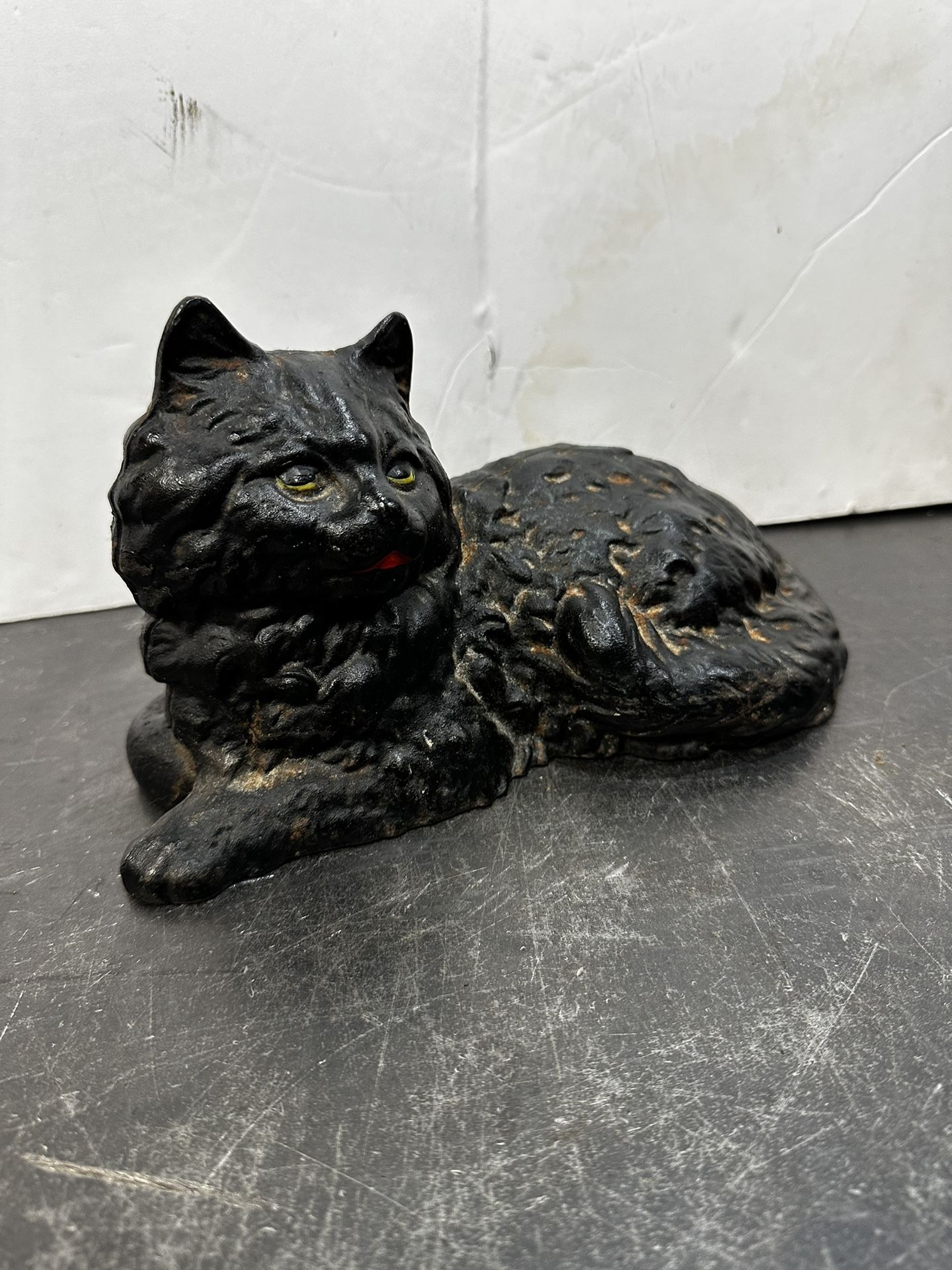 Antique Cast Iron Doorstop laying down black cat Cast Iron Art