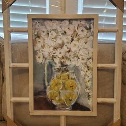 New artwork within window frame yellow flowers in Vase With lemon slices