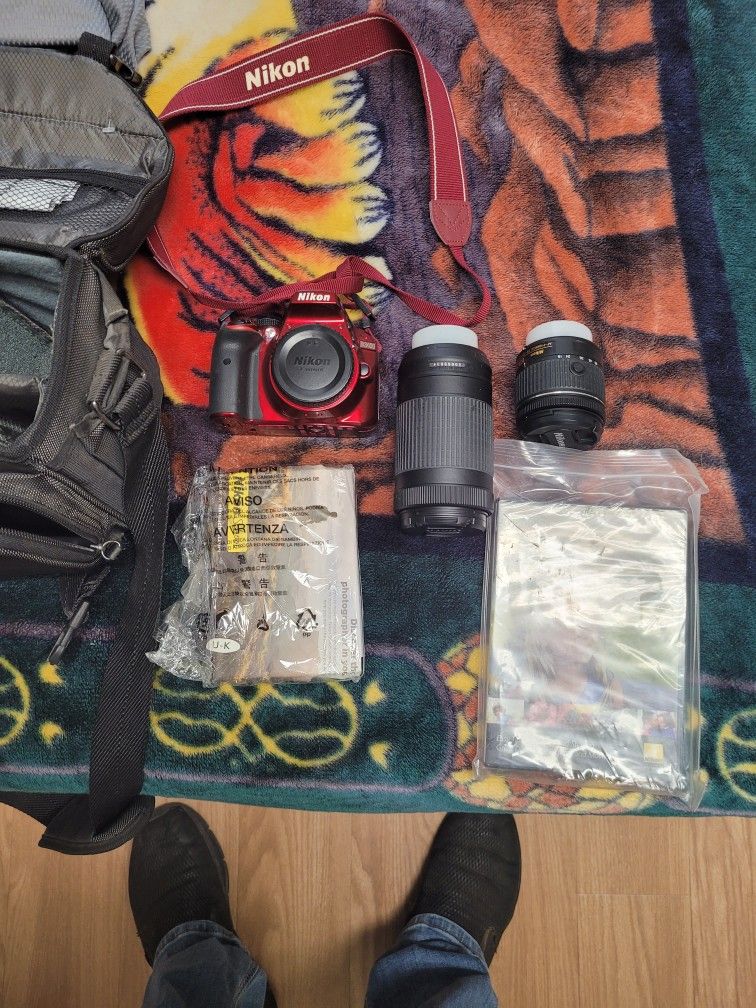 Nikon 3400 Camera With Two Iense Still Like New We Pade Over 800 For It Asking 400