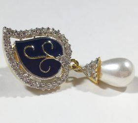 Cubic zirconia earrings with blue inlay