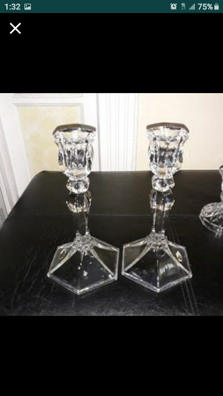 2 sets of Crystal clear Candlestick holders