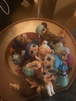 25 LOL dolls and case