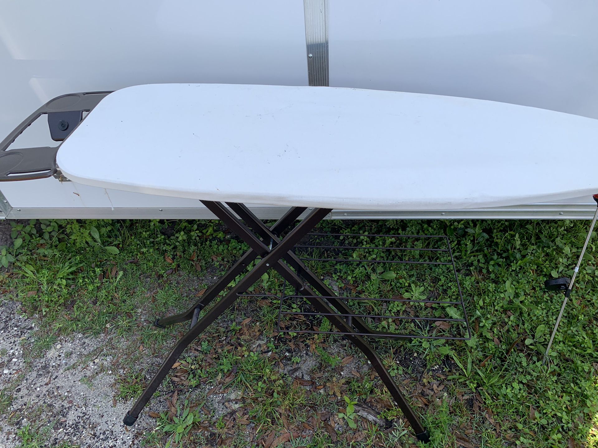 Nice quality ironing board with iron stand. Pick up in Jupiter.