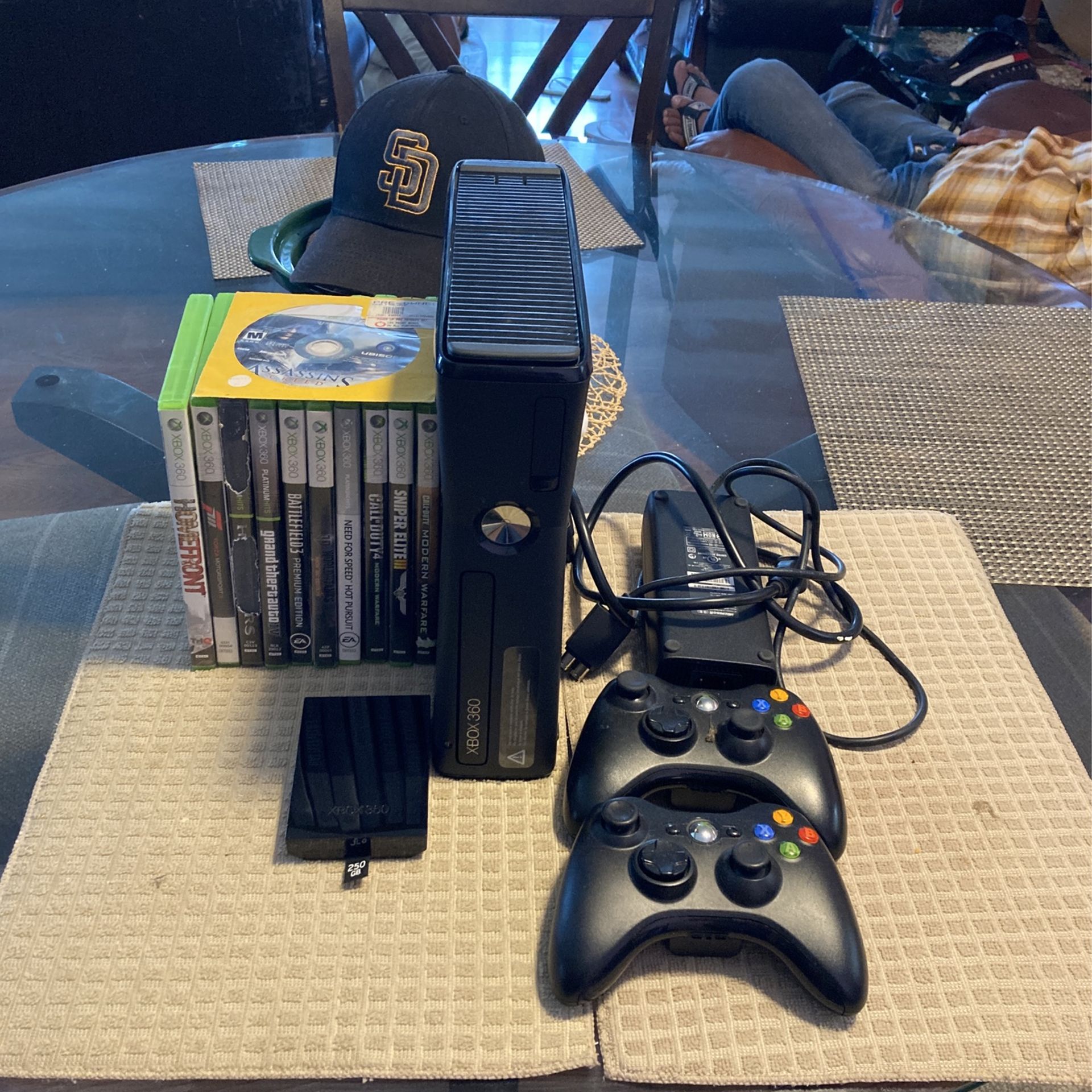 Xbox360 With 2 Controls 11 Games And 250GB For Sale $140 Or I Well  Trade For The Same Value 