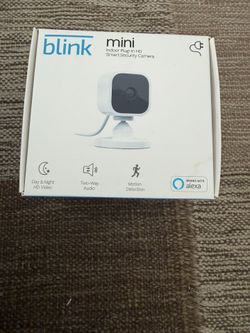 Blink Mini - Compact indoor plug-in smart security camera, 1080p HD video, night vision, motion detection, two-way audio, easy set up, Works with Alex
