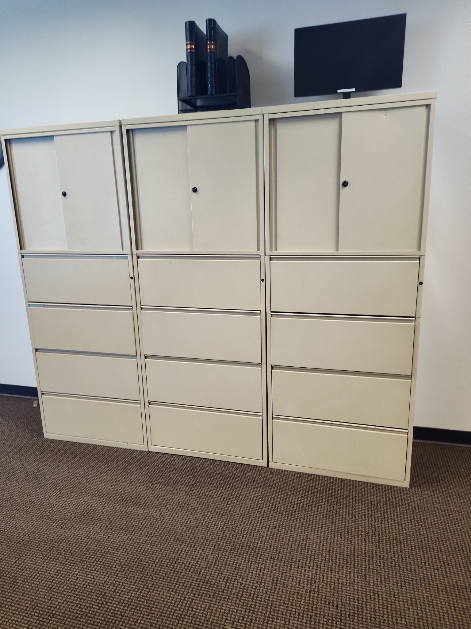 Three Filing Cabinets