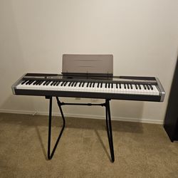 Casio Privia PX-300 keyboard with stand