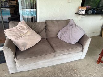 Sofa love seat with pull out bed