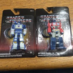 Lot Of 2 Transformers Figural Bag Clip. The figures are 3 inches tall.  Brand New Never Opened Factory Sealed