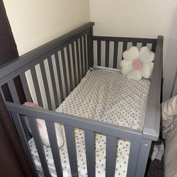 Grey crib