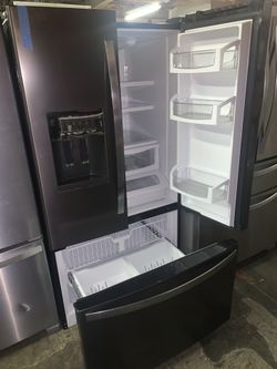 New scratch and dent Whirlpool 36in. Black stainless steel french doors fridge with 6 months warranty
