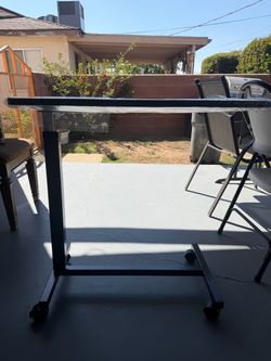 Medical adjustable rolling table