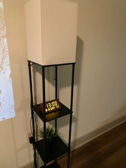 Floor lamp with shelves