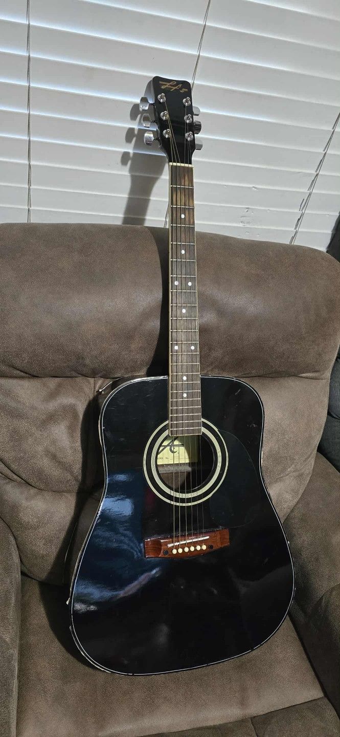 ACOUSTIC GUITAR $59
