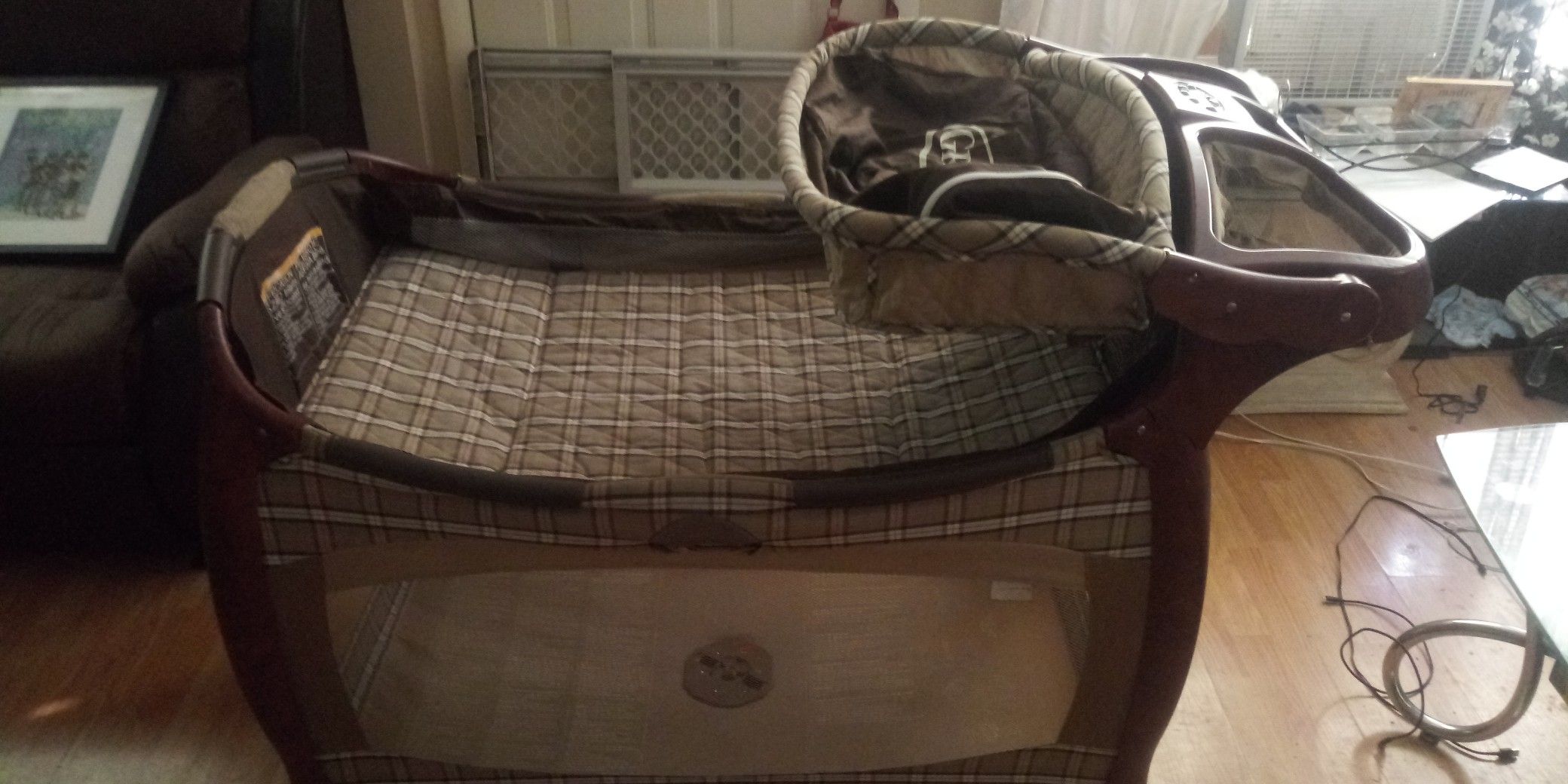 Graco playpen has all parts for newborn to toddler also changing table wipes and diaper holder. Plays 🎶 music has carrier bag