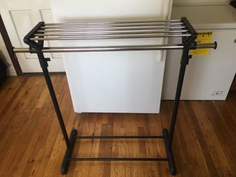 Steel Clothes hungers with shelves in good condition.