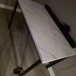 White Marble And Black Dining Table