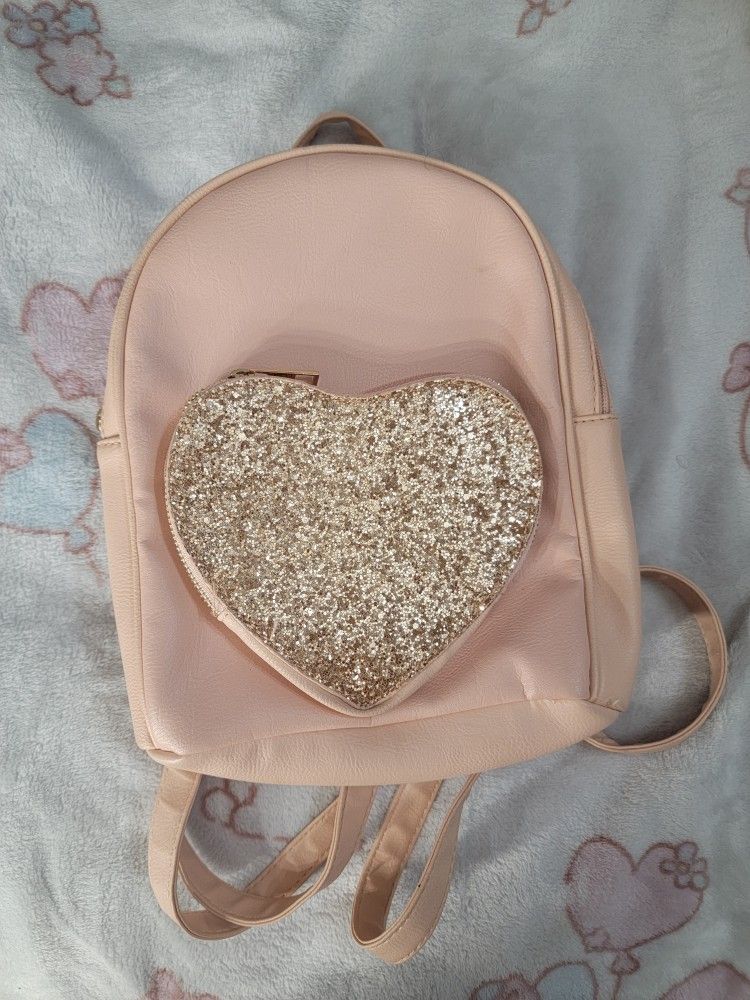 pink sparkly heart backpack