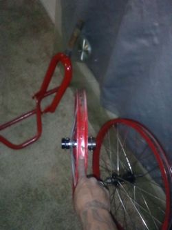 Double side sprocket 12 tooth with a 14 tooth BMX 20 inch red rims