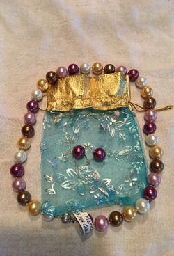 12mm - 18 in. Multi color pearl necklace with matching earrings. We have other sizes