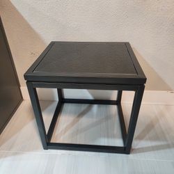 Metal and table with glass on top