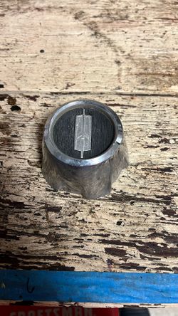 Oldsmobile Cutlass center wheel cap