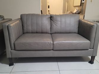 Leather Love Seat, Chair And Ottoman