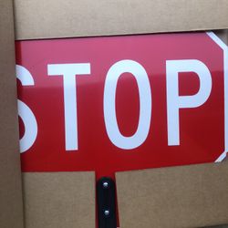 New Construction Stop Sign and Safety Vest
