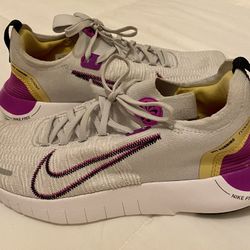 Woman’s Nature Road Running Shoe. by Nike size 9