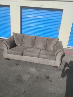 Brown sofa couch modern Ashley furniture - delivery available