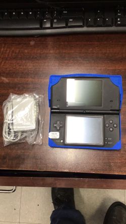 Nintendo DSi (black) with Rubber Pikachu Case and charger