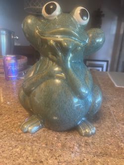Cute green, ceramic frog garden statue