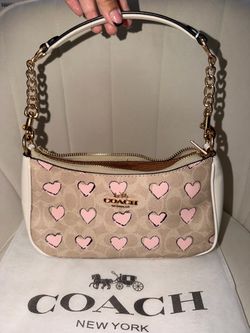 Beige and white handbag