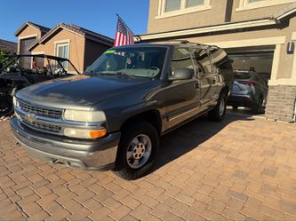 2001 Chevrolet Suburban and 2008 Honda crv