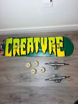 Creature Skateboard Deck with independent Trucks and Wheels