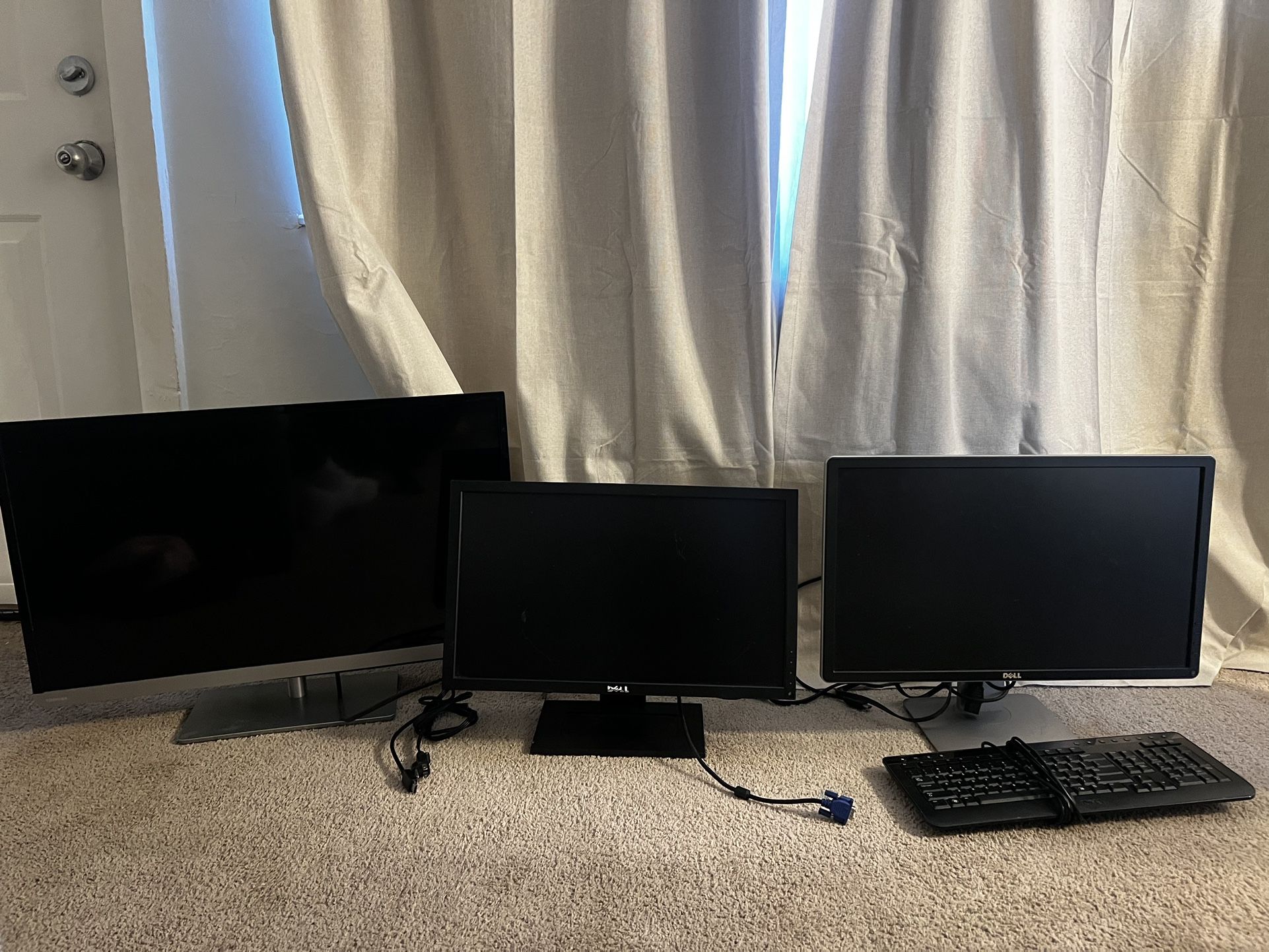 2 Dell  Monitor And A Toshiba Television Receiver 