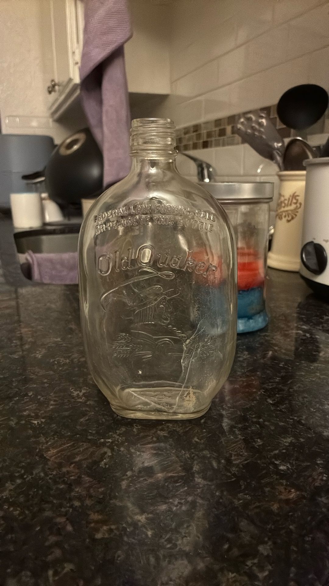 Old Quaker Vintage Embossed One Pint Whiskey Bottle