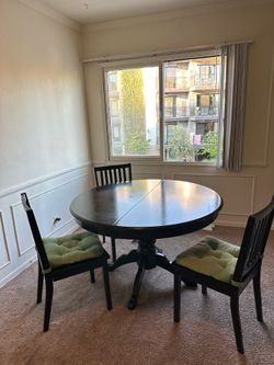 Black wood dining table and chairs set