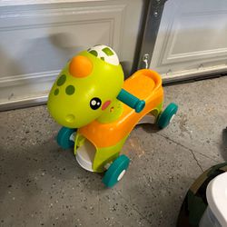 Fisher Price Dinosaur Ride On Toy
