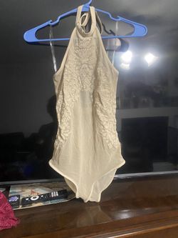 Nude color small bodysuit must pick up Coors and Rio bravo