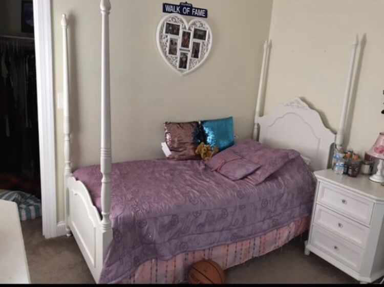 Twin bed along with mattress