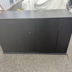 black 2. door console storage cabinet 49 1/2” long  19 1/2” deep  28 1/2” tall 