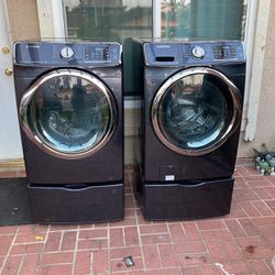 USED LIKE NEW 7.5 cu.ft. vented Smart Electric Dryer/ Washer combo with Sensor Dry in Brushed Black.