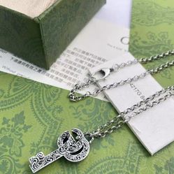 Retro old necklace key-shaped vine carving