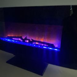 FIREPLACE- $99 - Multiple  Color Settings-Faux wood With Crystals