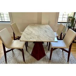 Modern Marble Dining Table with 4 White Leather Chairs – $1,500 (Retail $4,595)