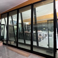 Multi Sliding Glass Black Doors 193”x121”OXXX