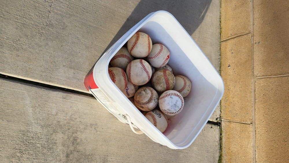 Bucket Of Baseballs Wiffle Balls And Various Other Balls